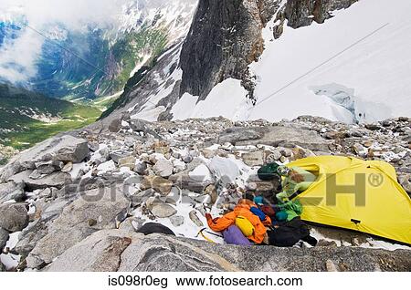 A female climber camping on glacier View Large Photo Image Stock Image - A female climber camping on glacier. Fotosearch