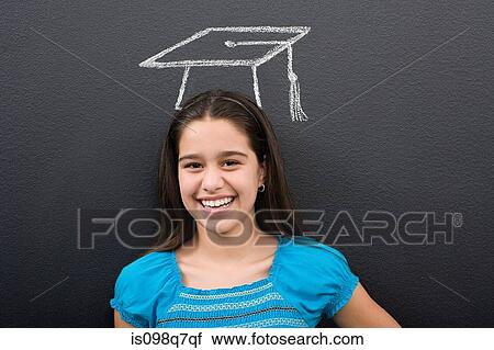 Stock Image - A girl with a chalk mortar board. Fotosearch