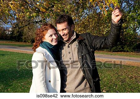 A happy couple in dulwich park View Large Photo Image Stock Image - A happy couple in dulwich park. Fotosearch
