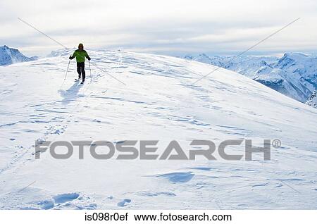 A man skiing on selkirk mountains View Large Photo Image Stock Image - A man skiing on selkirk mountains. Fotosearch