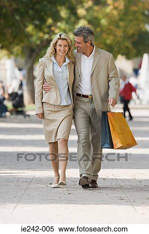 Stock Photography - A mature couple walking. Fotosearch
