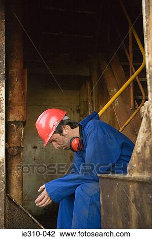 A worker thinking View Large Photo Image Stock Image - A worker thinking. Fotosearch