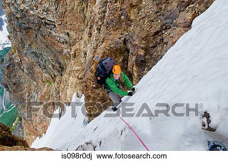 A young woman climbing mount fury View Large Photo Image Stock Image - A young woman climbing mount fury. Fotosearch