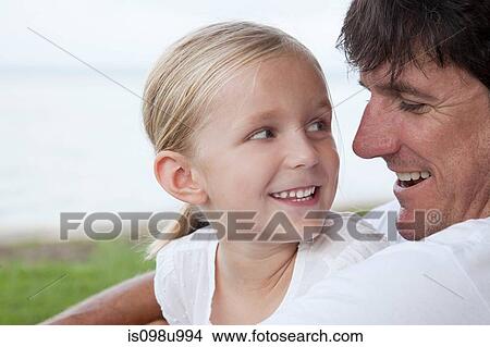 Affectionate father and daughter View Large Photo Image Picture - Affectionate father and daughter. Fotosearch