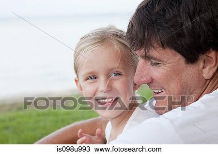 Affectionate father and daughter View Large Photo Image Stock Image - Affectionate father and daughter. Fotosearch