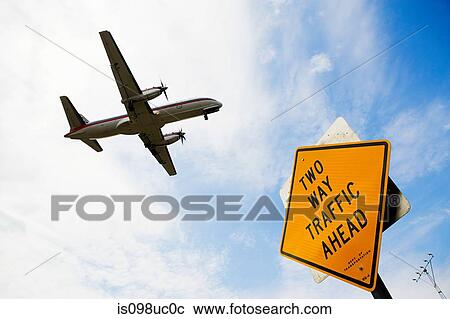 Airplane and sign View Large Photo Image Stock Image - Airplane and sign. Fotosearch