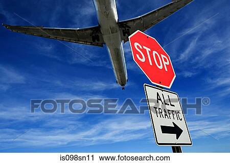Airplane and stop sign View Large Photo Image Stock Image - Airplane and stop sign. Fotosearch