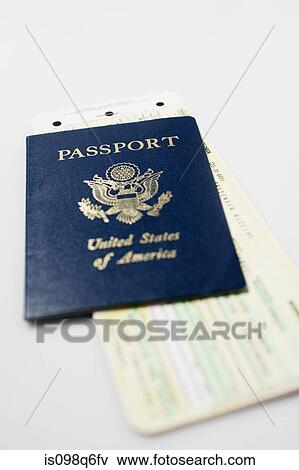 Stock Photo - Airplane tickets and a passport. Fotosearch