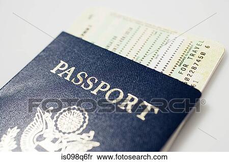 Airplane tickets and a passport View Large Photo Image Stock Photography - Airplane tickets and a passport. Fotosearch