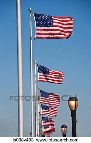 Stock Image - American flags and lamp posts. Fotosearch