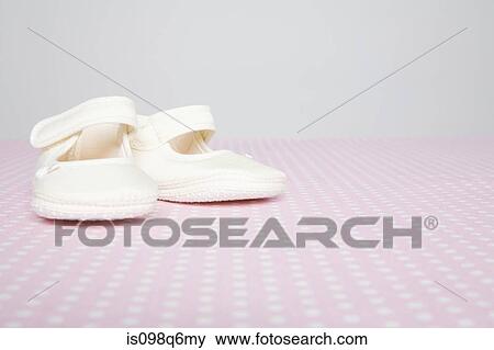 Stock Photo - Baby shoes. Fotosearch