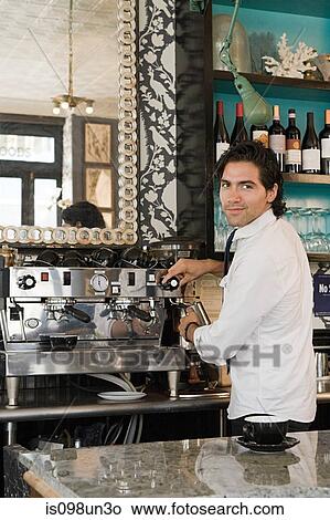 Barista at coffee shop View Large Photo Image Picture - Barista at coffee shop. Fotosearch