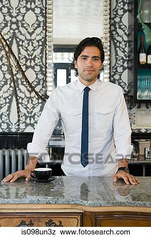 Barista at coffee shop View Large Photo Image Stock Photo - Barista at coffee shop. Fotosearch