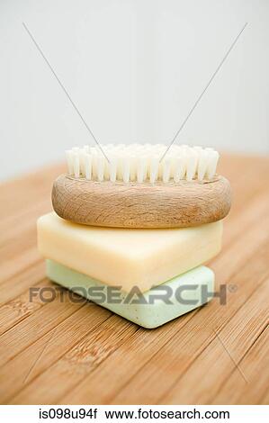 Stock Image - Bars of soap and nail brush. Fotosearch