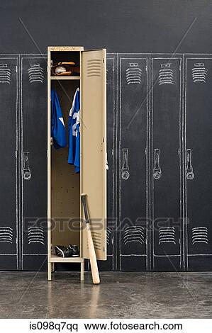 Baseball uniform hanging in a closet View Large Photo Image Stock Photography - Baseball uniform hanging in a closet. Fotosearch
