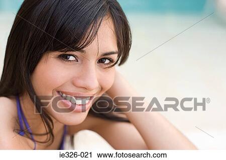 Stock Image - Beautiful young woman. Fotosearch
