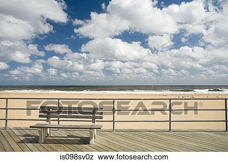 Bench on boardwalk View Large Photo Image Stock Photo - Bench on boardwalk. Fotosearch