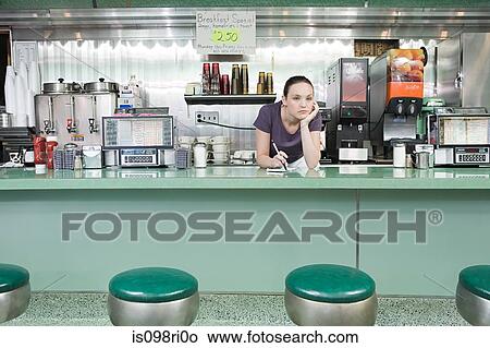 Bored waitress in a diner View Large Photo Image Picture - Bored waitress in a diner. Fotosearch