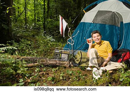 Boy at camp with radio View Large Photo Image Stock Photography - Boy at camp with radio. Fotosearch