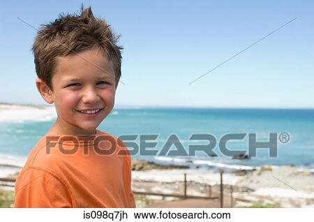 Boy at the seaside View Large Photo Image Stock Image - Boy at the seaside. Fotosearch