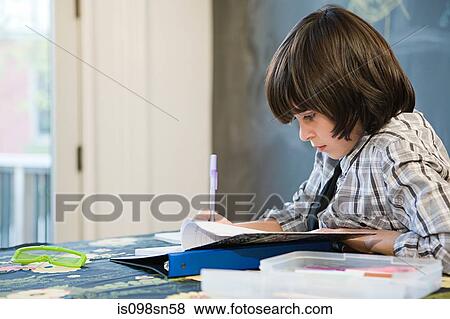 Boy doing homework View Large Photo Image Stock Photo - Boy doing homework. Fotosearch