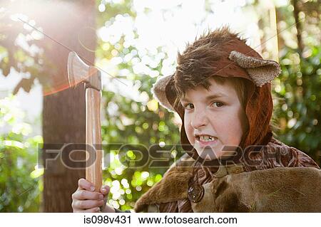 Boy dressed up as bear with toy axe View Large Photo Image Stock Image - Boy dressed up as bear with toy axe. Fotosearch