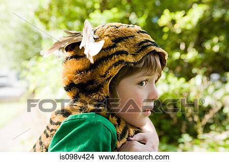 Picture - Boy dressed up as tiger. Fotosearch