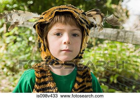 Stock Image - Boy dressed up as tiger. Fotosearch