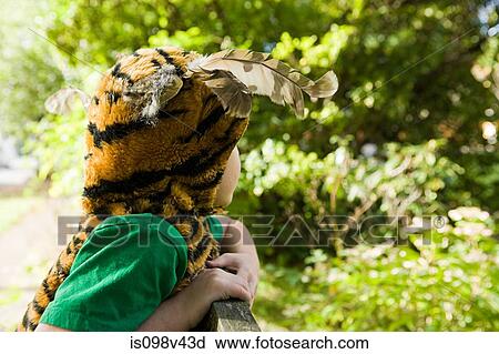 Stock Image - Boy dressed up as tiger. Fotosearch