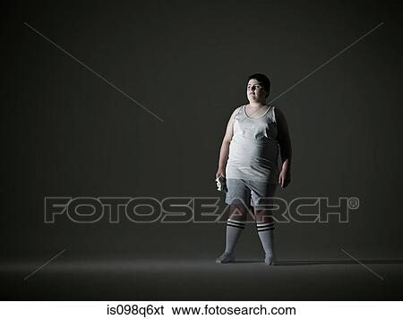 Stock Photograph - Boy holding video game controller. Fotosearch