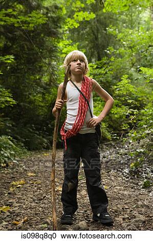 Boy in forest View Large Photo Image Stock Image - Boy in forest. Fotosearch