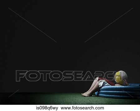 Boy in paddling pool View Large Photo Image Stock Photo - Boy in paddling pool. Fotosearch