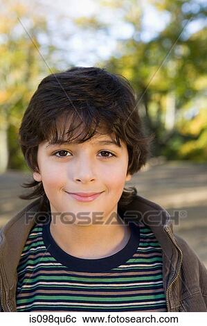 Stock Image - Boy in park. Fotosearch