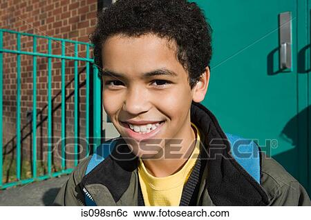 Boy outside school View Large Photo Image Stock Image - Boy outside school. Fotosearch