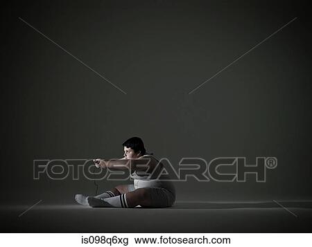 Boy playing video game View Large Photo Image Stock Image - Boy playing video game. Fotosearch