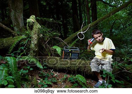 Boy using radio View Large Photo Image Stock Photo - Boy using radio. Fotosearch