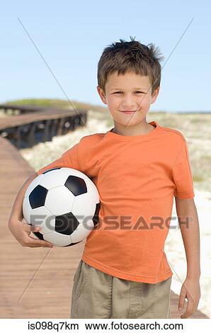 Picture - Boy with a football. Fotosearch