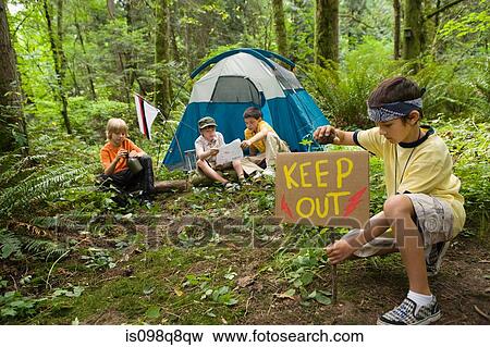 Boys camping in forest View Large Photo Image Stock Photo - Boys camping in forest. Fotosearch