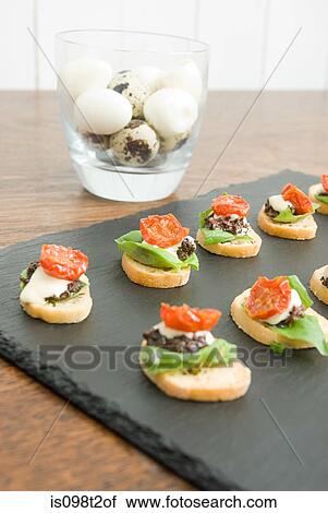 Bruschetta with quails eggs View Large Photo Image Stock Image - Bruschetta with quails eggs. Fotosearch