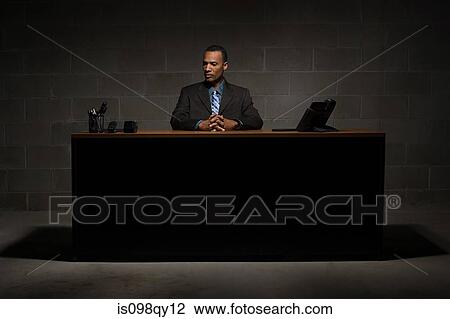 Businessman at desk View Large Photo Image Stock Image - Businessman at desk. Fotosearch