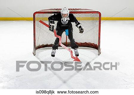 Businessman playing ice hockey View Large Photo Image Stock Image - Businessman playing ice hockey. Fotosearch