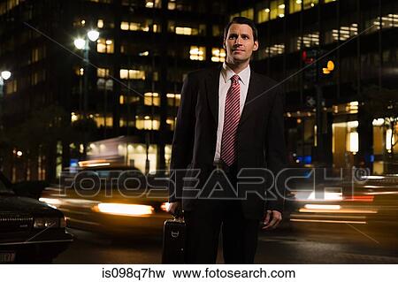 Stock Photo - Businessman standing in the road. Fotosearch