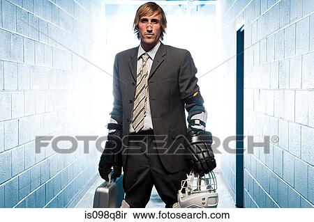 Businessman with an ice hockey uniform View Large Photo Image Stock Photography - Businessman with an ice hockey uniform. Fotosearch