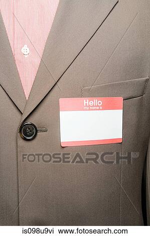 Stock Image - Businessman with blank name tag. Fotosearch