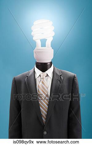 Businessman with energy saving lightbulb as head View Large Photo Image Stock Photo - Businessman with energy saving lightbulb as head. Fotosearch