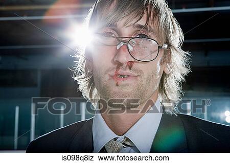 Businessman with facial injuries View Large Photo Image Stock Photo - Businessman with facial injuries. Fotosearch