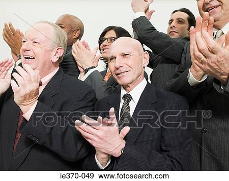 Businessmen clapping View Large Photo Image Stock Photo - Businessmen clapping. Fotosearch