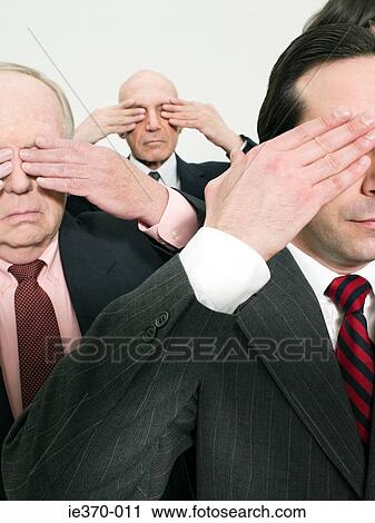 Stock Image - Businessmen covering eyes. Fotosearch