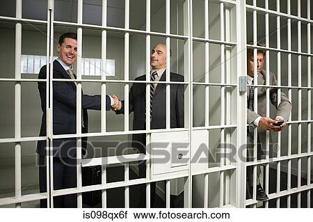 Businessmen in jail View Large Photo Image Stock Image - Businessmen in jail. Fotosearch