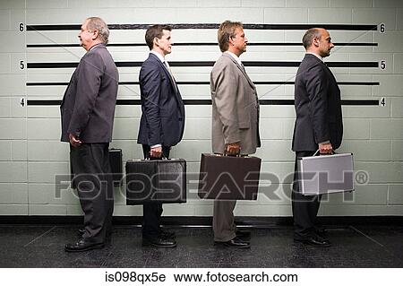Stock Image - Businessmen in lineup. Fotosearch